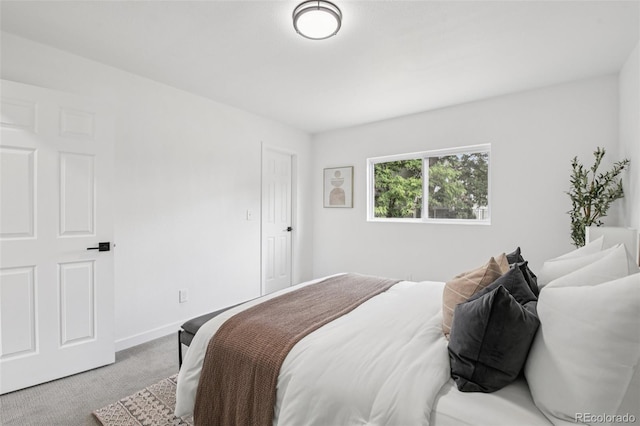19954 E Dartmouth Ave, Aurora, CO 80013 - bedroom with carpet floors and baseboards