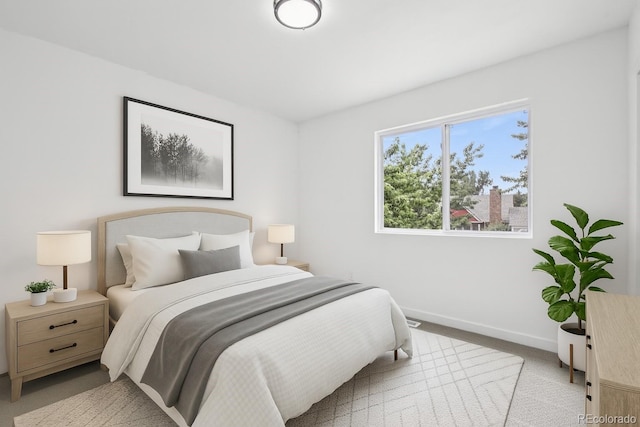 19954 E Dartmouth Ave, Aurora, CO 80013 - carpeted bedroom featuring baseboards