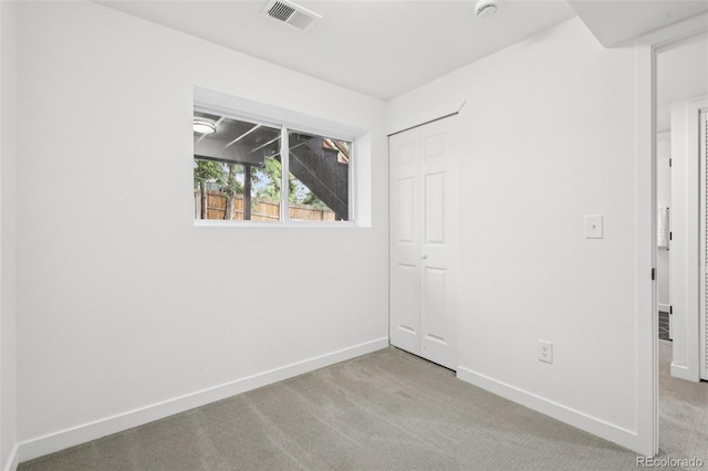 19954 E Dartmouth Ave, Aurora, CO 80013 - unfurnished bedroom with carpet floors and a closet
