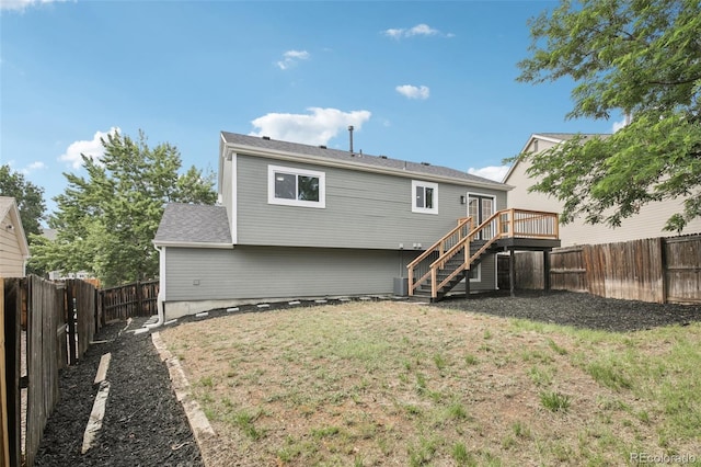 19954 E Dartmouth Ave, Aurora, CO 80013 - rear view of property with stairs, a deck, and a fenced backyard