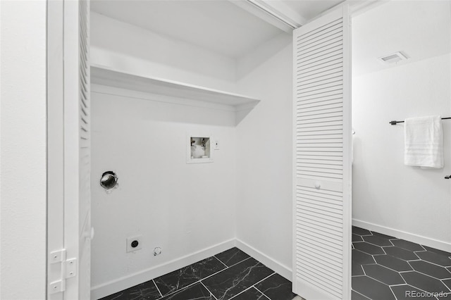 19954 E Dartmouth Ave, Aurora, CO 80013 - laundry area with hookup for an electric dryer, hookup for a gas dryer, dark marble finish floors, and hookup for a washing machine