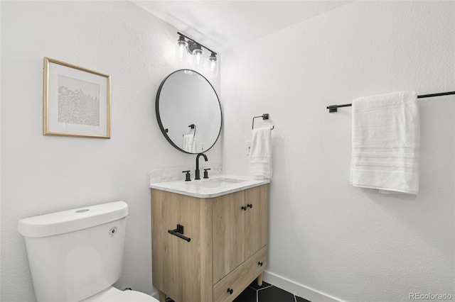 19954 E Dartmouth Ave, Aurora, CO 80013 - bathroom with vanity and toilet
