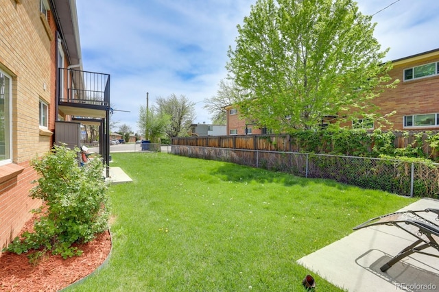 10491 W 7th Pl, Lakewood, CO 80215 - view of yard featuring a balcony