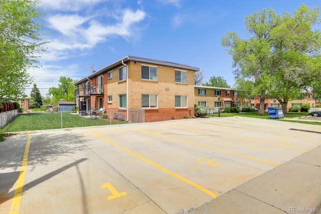 10491 W 7th Pl, Lakewood, CO 80215 - view of building exterior featuring uncovered parking