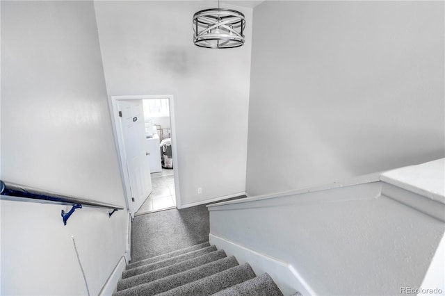 10491 W 7th Pl, Lakewood, CO 80215 - stairs featuring carpet and baseboards