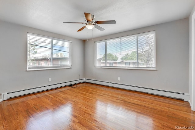 10491 W 7th Pl, Lakewood, CO 80215 - unfurnished room featuring wood finished floors, ceiling fan, and a baseboard radiator