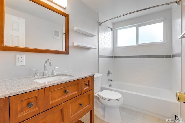 10491 W 7th Pl, Lakewood, CO 80215 - bathroom with toilet, shower / bathtub combination, vanity, and tile patterned floors