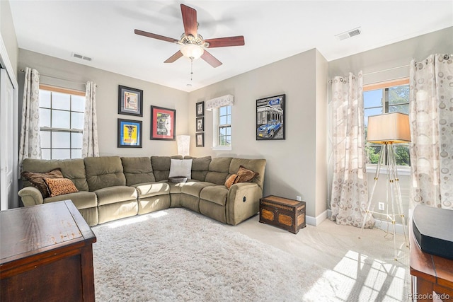 3357 N Akron Ct, Denver, CO 80238 - carpeted living area with ceiling fan and baseboards