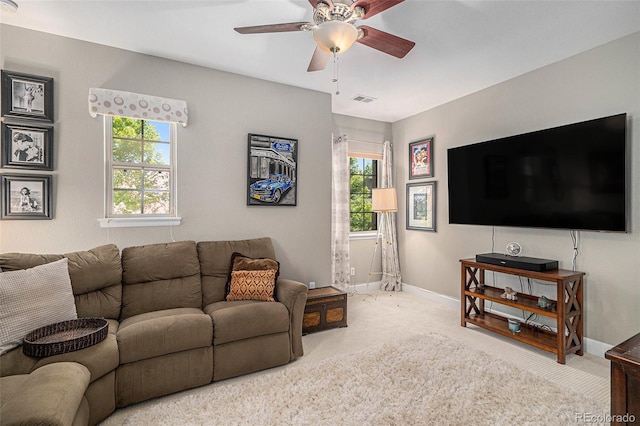 3357 N Akron Ct, Denver, CO 80238 - living area with carpet flooring, ceiling fan, and plenty of natural light