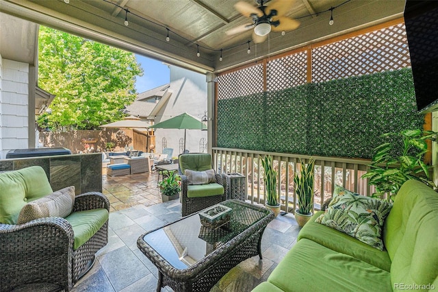 3357 N Akron Ct, Denver, CO 80238 - view of patio with an outdoor living space and ceiling fan