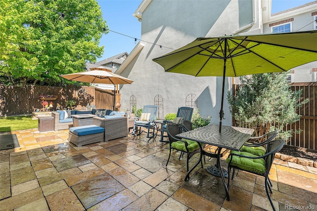 3357 N Akron Ct, Denver, CO 80238 - fenced backyard with an outdoor hangout area, a patio, and outdoor dining area