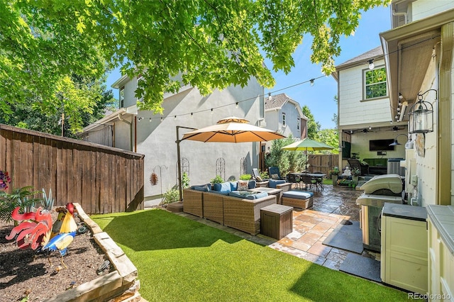 3357 N Akron Ct, Denver, CO 80238 - fenced backyard featuring an outdoor hangout area and a patio