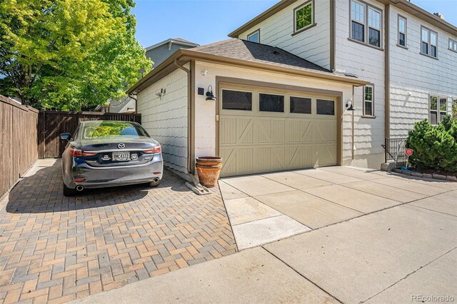 3357 N Akron Ct, Denver, CO 80238 - view of side of home with concrete driveway