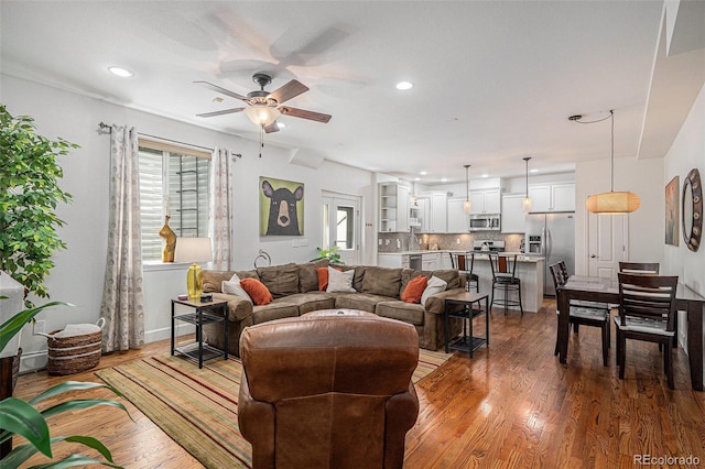 3357 N Akron Ct, Denver, CO 80238 - living area featuring a ceiling fan, dark wood-style flooring, and recessed lighting