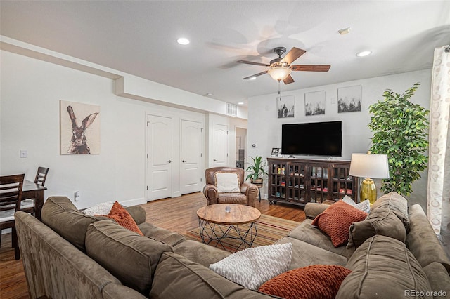 3357 N Akron Ct, Denver, CO 80238 - living area featuring ceiling fan, wood finished floors, and recessed lighting