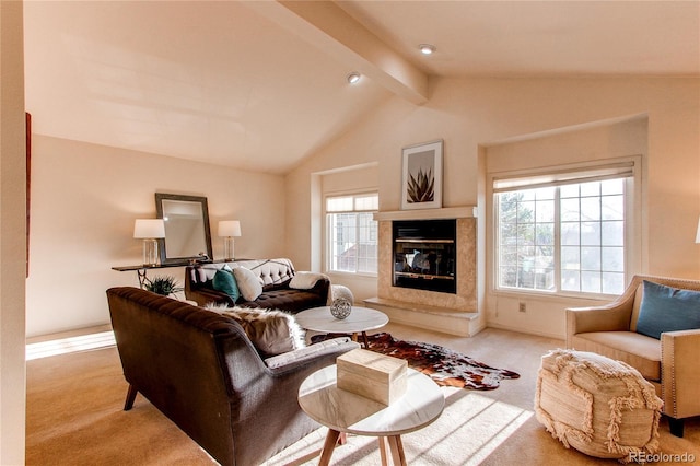 1530 S Quebec Way Unit 29, Denver, CO 80231 - carpeted living area with a fireplace, lofted ceiling with beams, and plenty of natural light
