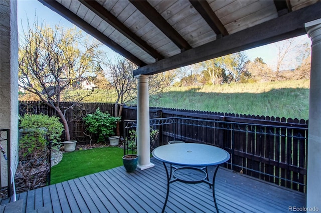 1530 S Quebec Way Unit 29, Denver, CO 80231 - wooden deck with a fenced backyard
