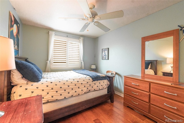 919 Taylor Ln, Erie, CO 80516 - bedroom featuring wood finished floors and a ceiling fan