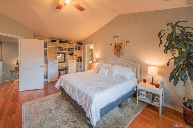 919 Taylor Ln, Erie, CO 80516 - bedroom featuring lofted ceiling, wood finished floors, and ceiling fan
