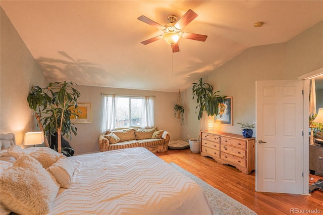 919 Taylor Ln, Erie, CO 80516 - bedroom featuring lofted ceiling, wood finished floors, and a ceiling fan