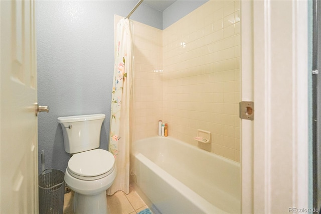 919 Taylor Ln, Erie, CO 80516 - bathroom with shower / bath combination with curtain and tile patterned floors