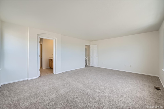 spare room with carpet flooring