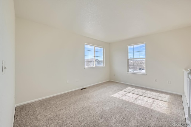 spare room with carpet flooring