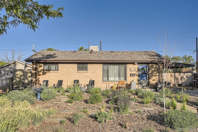 3224 Troy St, Aurora, CO 80011 - single story home featuring brick siding and a shingled roof