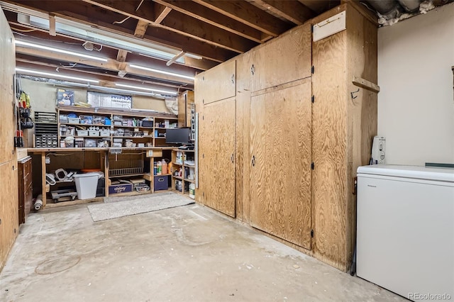 3224 Troy St, Aurora, CO 80011 - unfinished basement featuring refrigerator and washer / clothes dryer