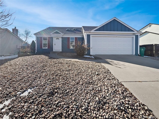 ranch-style home with concrete driveway, board and batten siding, and an attached garage