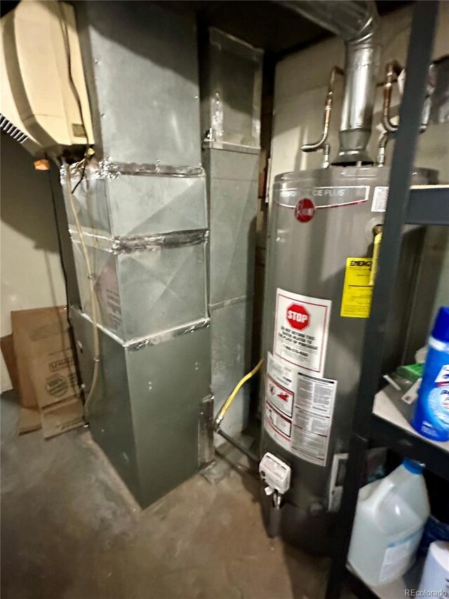 utility room with water heater and heating unit