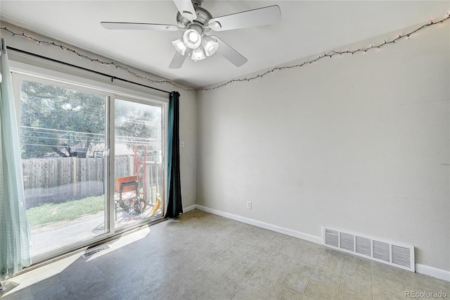 empty room featuring ceiling fan