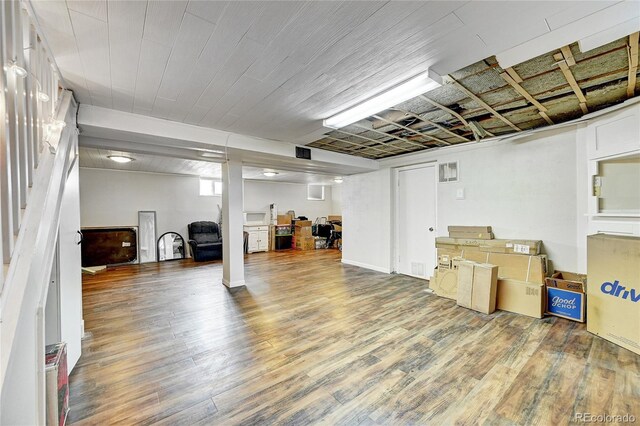 basement with wood-type flooring