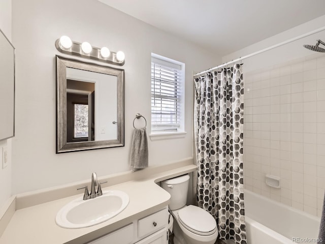 full bathroom with shower / bath combo, toilet, and vanity