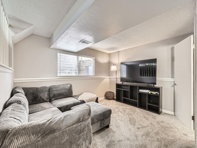 living room with carpet, a textured ceiling, and vaulted ceiling