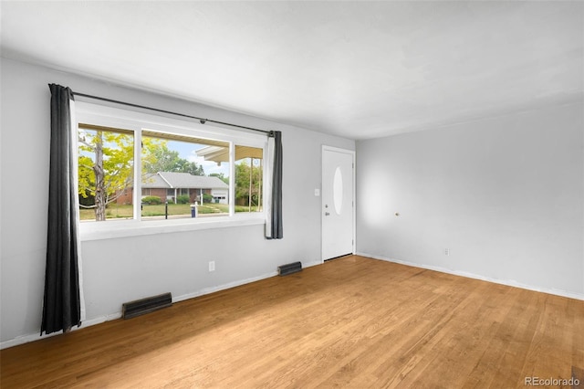 3341 W 94th Ave, Westminster, CO 80031 - spare room featuring wood finished floors and baseboards