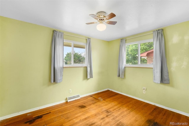 3341 W 94th Ave, Westminster, CO 80031 - unfurnished room with healthy amount of natural light, wood finished floors, and ceiling fan