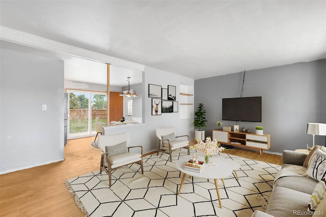 3341 W 94th Ave, Westminster, CO 80031 - living area with wood finished floors and baseboards