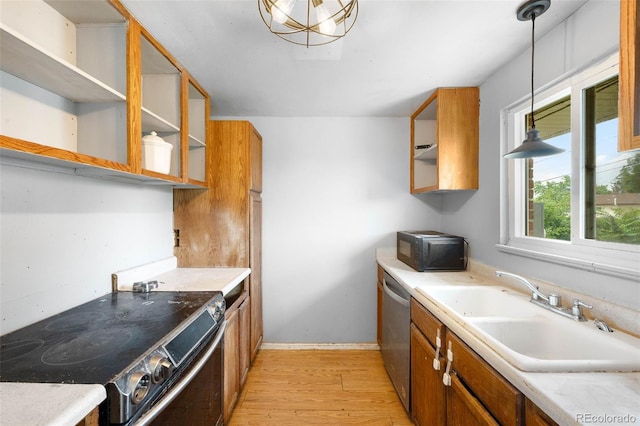 3341 W 94th Ave, Westminster, CO 80031 - kitchen with electric range oven, open shelves, black microwave, dishwasher, and brown cabinets