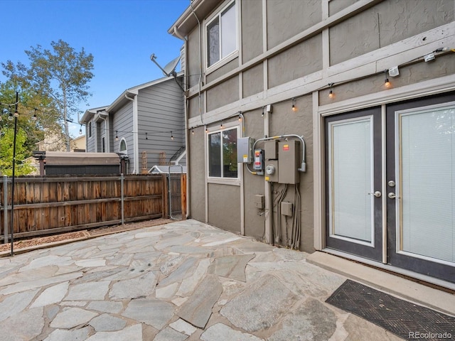 view of patio / terrace featuring fence
