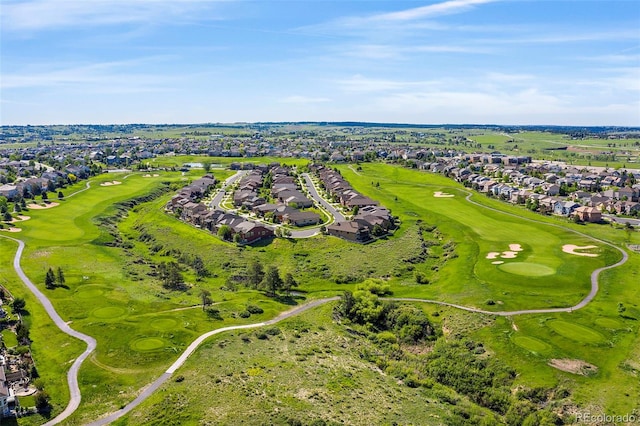 aerial view with a residential view and view of golf course