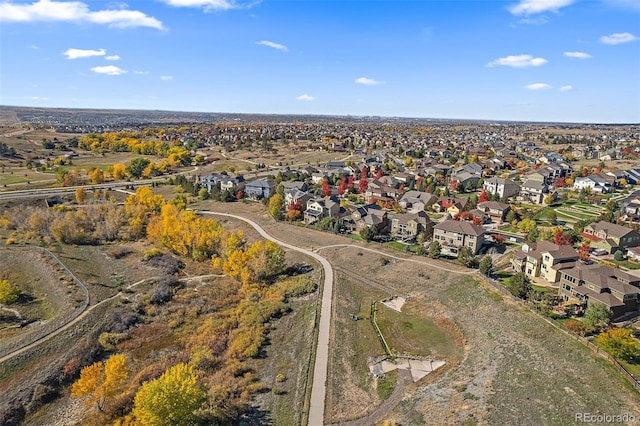 birds eye view of property with a residential view