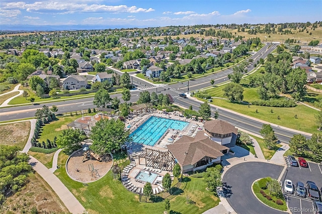 birds eye view of property with a residential view