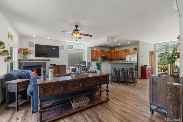 107 Mountain Vista Ln, Silverthorne, CO 80498 - living room featuring plenty of natural light, light wood finished floors, ceiling fan, and recessed lighting