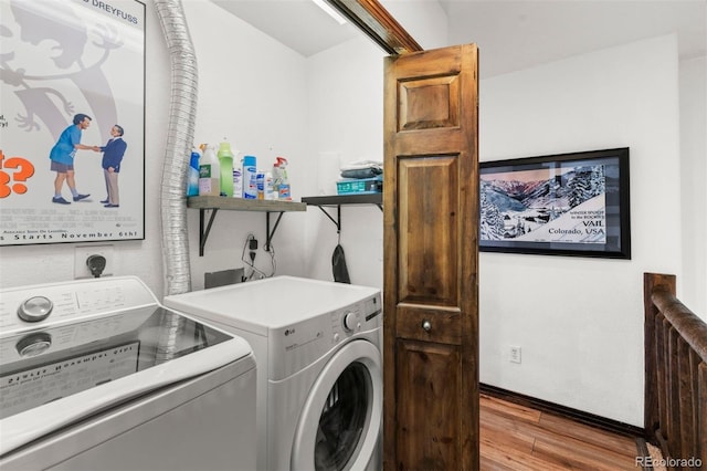 107 Mountain Vista Ln, Silverthorne, CO 80498 - laundry area featuring separate washer and dryer and wood finished floors