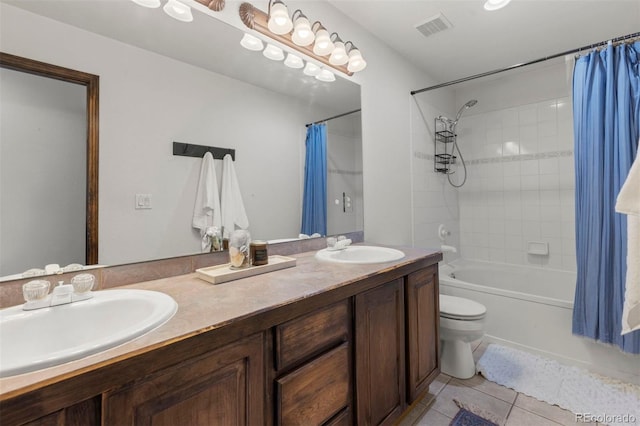 107 Mountain Vista Ln, Silverthorne, CO 80498 - full bathroom with tile patterned floors, double vanity, and shower / tub combo