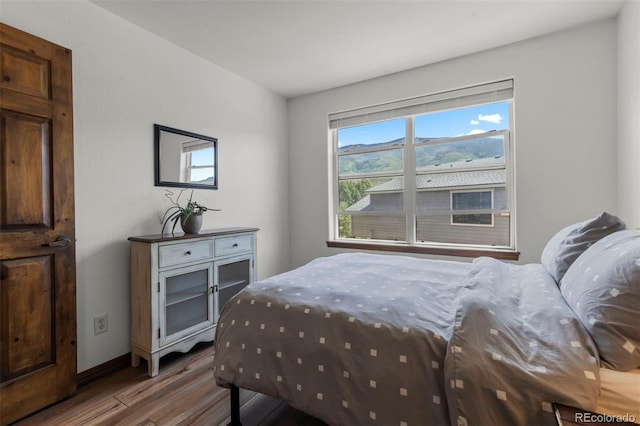 107 Mountain Vista Ln, Silverthorne, CO 80498 - bedroom with wood finished floors and baseboards