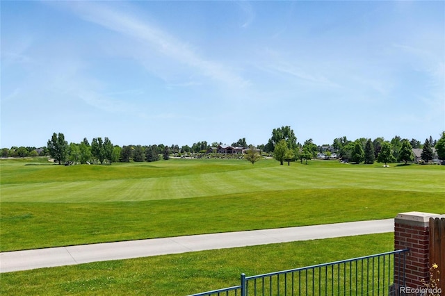 6776 Salvia Ct, Arvada, CO 80007 - view of community featuring golf course view and a lawn