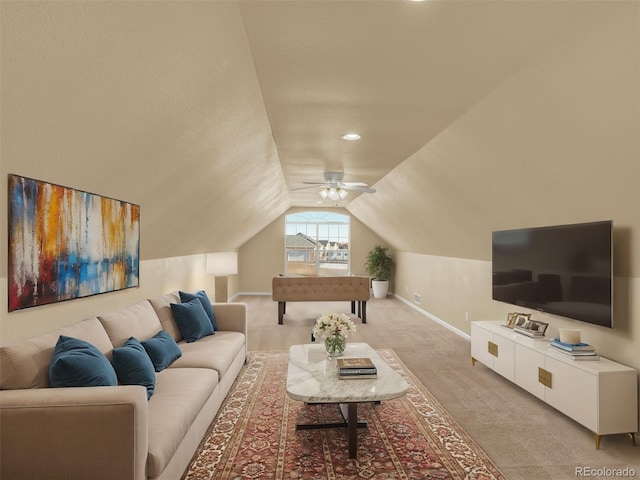 living room featuring ceiling fan, light colored carpet, and lofted ceiling