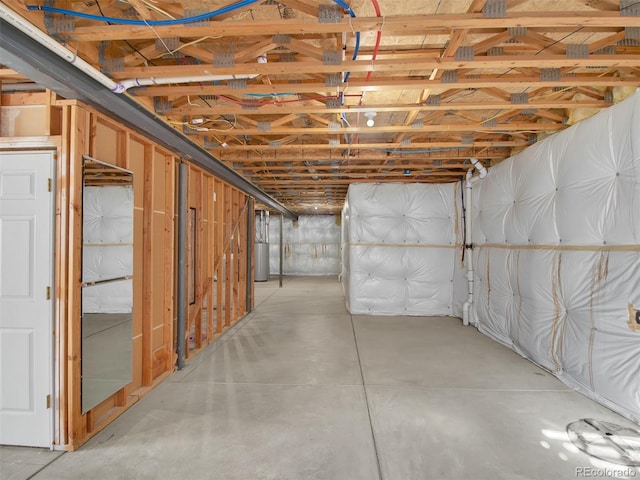 basement featuring water heater